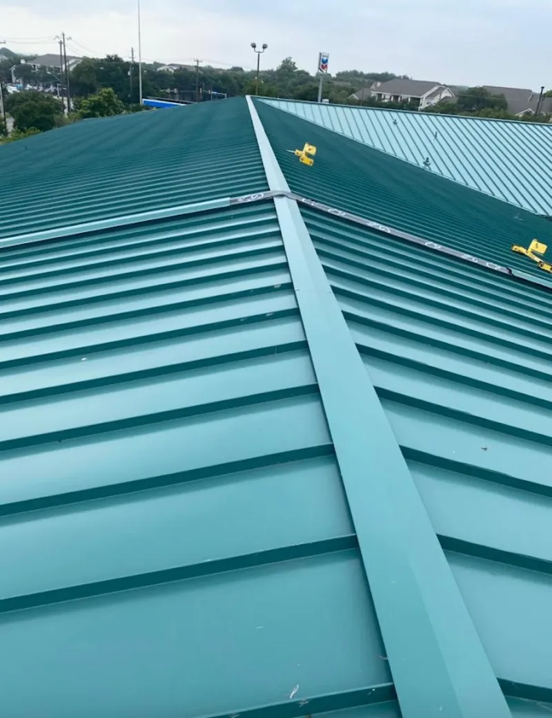 Green commercial metal roof ridge and valley for Metal Roof Repair in Scarsdale